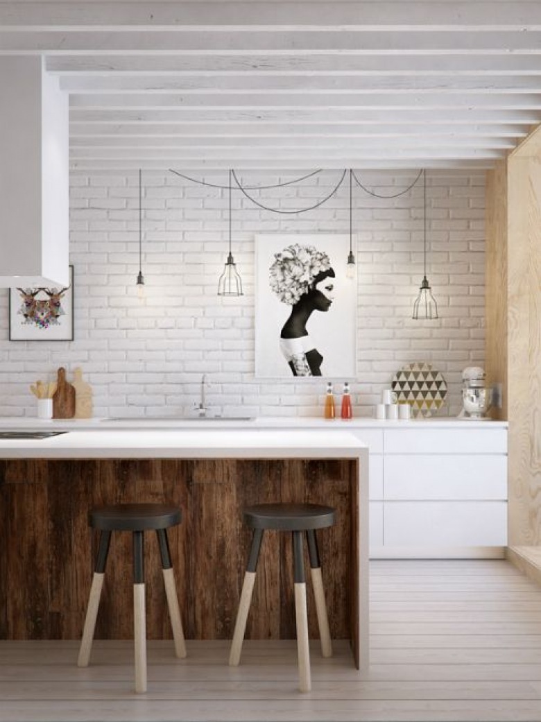 Drewniane stołki z czarnymi siedziskami, żarówki na kablach,biała cegła i nowoczesne szafki w białej kuchni (25297)