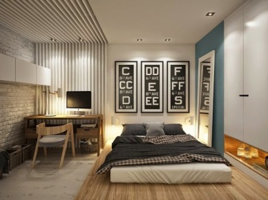 Biała cegła na ścianie w sypialni,tapeta ścienna w biało-szare paski,drewniane nowoczesne biurko i krzesło,materac na drewnianym podeście w sypialni (26852)