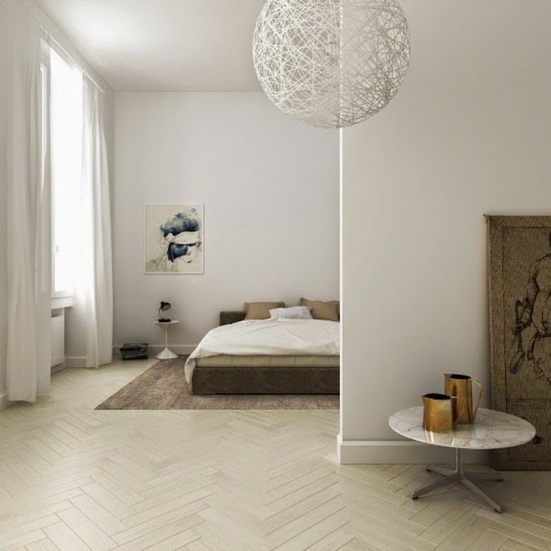 Biało-beżowa sypialnia w otwartym widoku mieszkania z ażurową kulistą lampą i okrągłym małym stolikiem (25719)