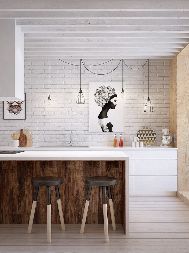 Biała cegła na ścianie,białe szafki kuchenne,druciane abażury i żarówki na kablach,bialy okap nad wyspą kuchenną ze stołkami (24800)