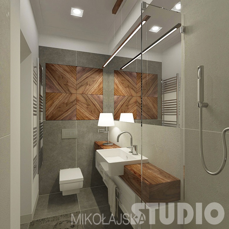 Szary betonowy gres na ścianie i podłodze w łazience z drewnianymi dekorami i blatem szafki z umywalką (26051)