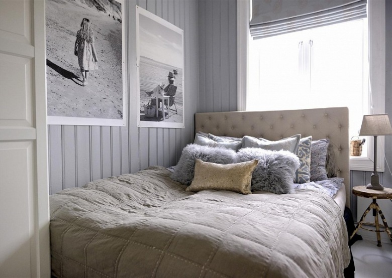Pikowane łóżko,czarno-białe fotografie,futerkowe poduszki i industrialny stołek przy łóżku (23951)
