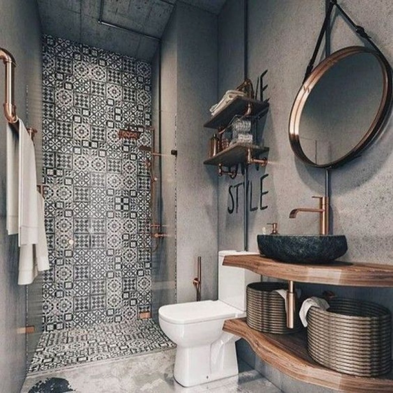 Wzorzyste płytki z marokańskim motywem tworzą oryginalny charakter łazienki. Ciemna kolorystyka wygląda bardzo elegancko. Drewniane blaty dodają naturalności, a jednocześnie podkreślają stylowość...