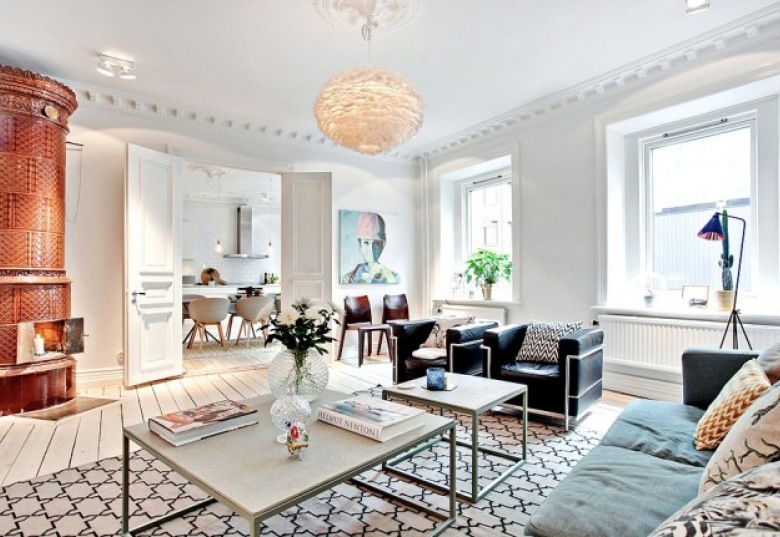 Przestronne stylowe mieszkanie w skandynawskim klimacie z efektowną grą świateł w salonie ()