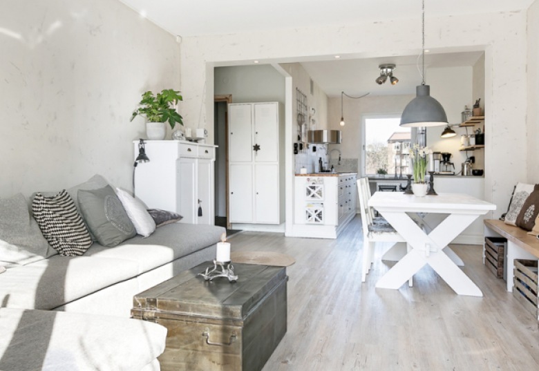 Aranżacja mieszkania w stylu skandynawskim w odcieniach bieli i szarości z naturalnymi motywami ()