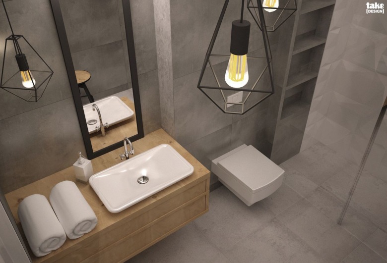 Industrialny klimat łazienki przejawia się przede wszystkim nieco minimalistycznym wyposażeniem, chłodem wybranej...