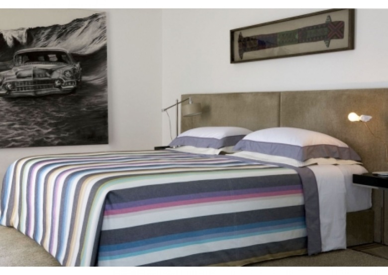jak udekorować łóżko w nowoczesnej sypialni ? wystarczy wybrać narzutę w ulubionych kolorach - paski zawsze są modne i...