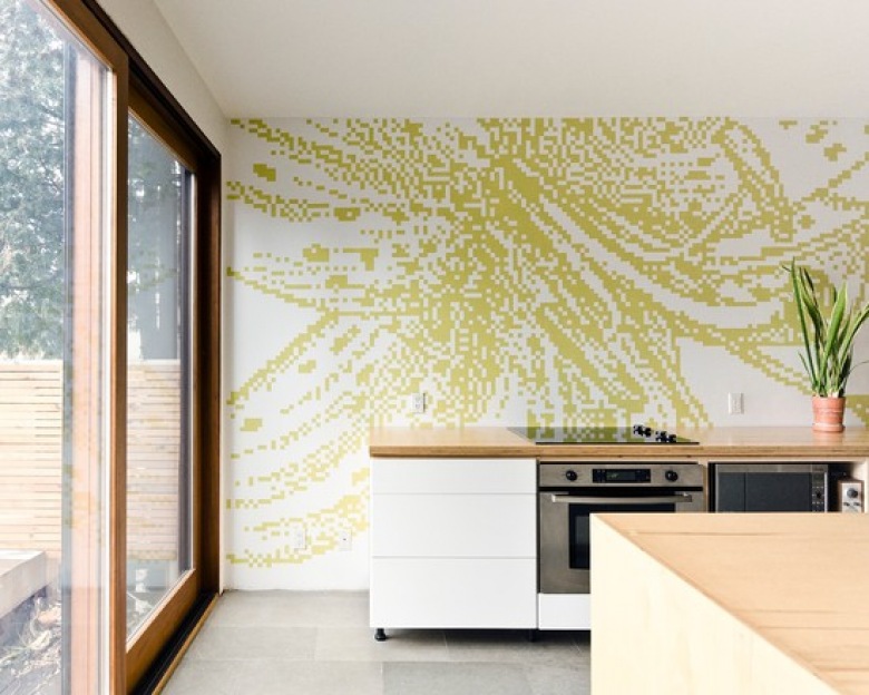 nowoczesna kuchnia, gdzie projekt mebli uzupełnia dekoracyjna ściana - każdy może wybrać inny,wg stylu i upodobań.