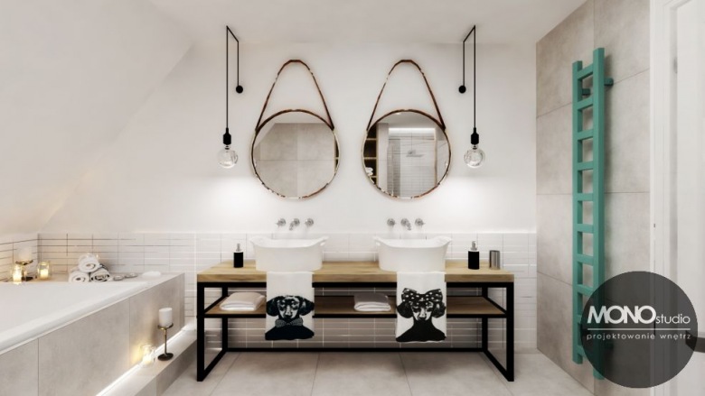 W białej łazience na poddaszu aranżację oparto na wyraźnej symetrii. Dwie umywalki osadzone na drewnianym stole, dwa...