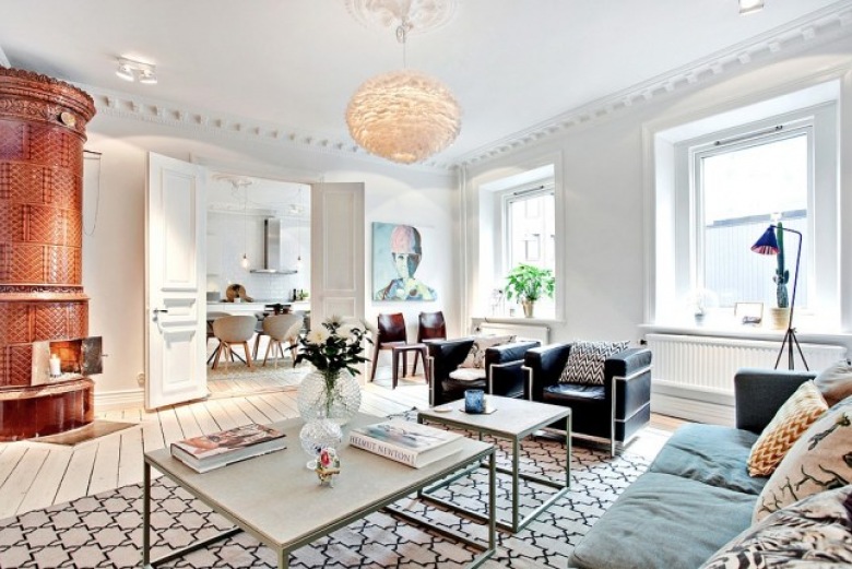 Przestronne stylowe mieszkanie w skandynawskim klimacie z efektowną grą świateł w salonie (42369)