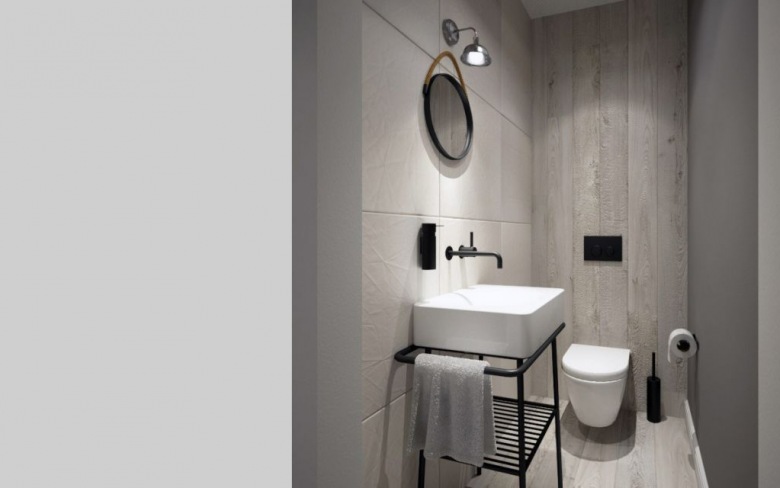Szare ściany w łazience, Metalowa pólka na prostokątny zlew utrzymana została w industrialnym stylu. Do tego małe...