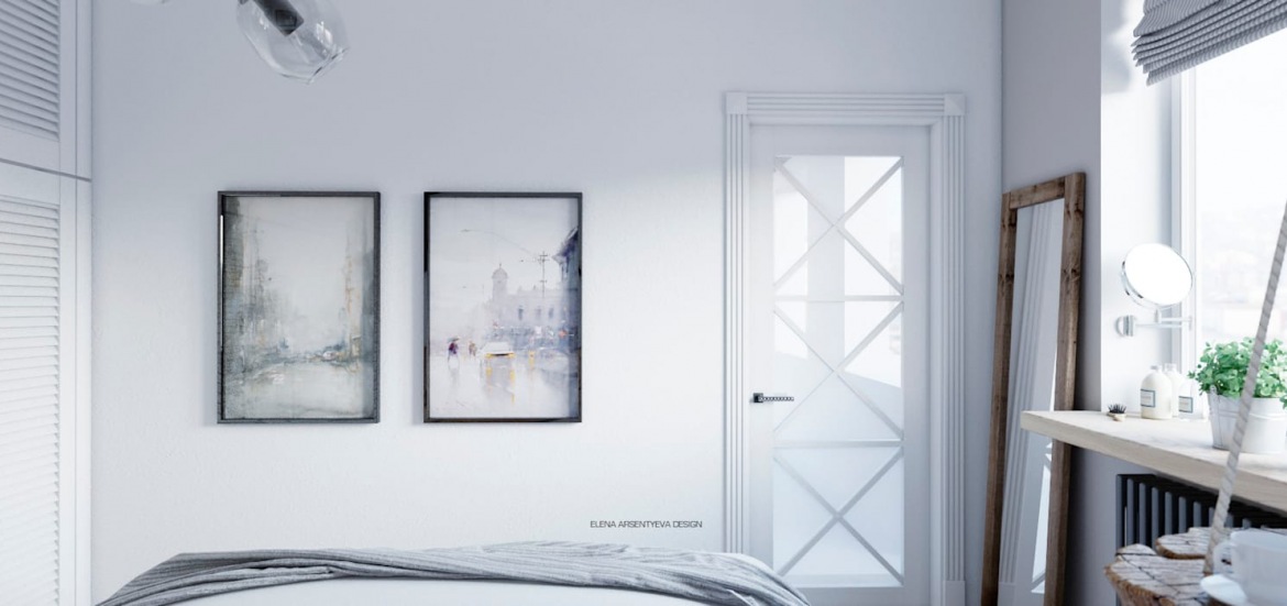 Naprzeciw łóżka w sypialni zawieszono dwa obrazy w identycznych czarnych ramkach. Wysokie lustro oparte o ścianę w...