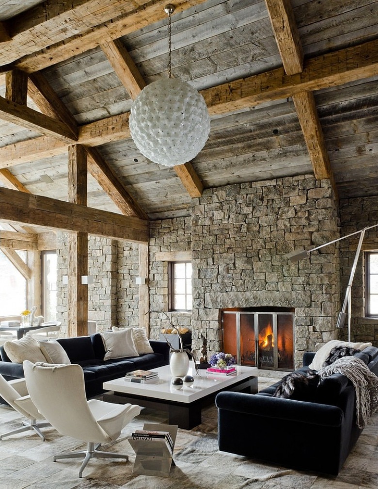 solidny dom zbudowany z szarego kamienia naturalnego - rezydencja w stylu rustykalnym na mroźne i śnieżne...
