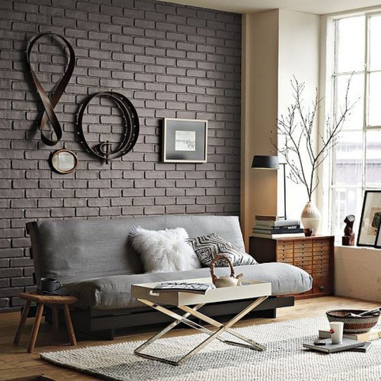 aranżacja salonu ze ścianą w cegle - piękny i modny kolor szarej cegły jest dobrym miejscem na ekspozycję...