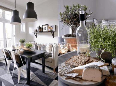 Biało szary dywan,czarny stół i wiszące lampy industrialne w aranzacji jadalni z salonem (23952)