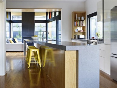bardzo nowoczesna i dizajnerska, duża kuchnia - to połączenie drewna i kompozytów syntetycznych typu...