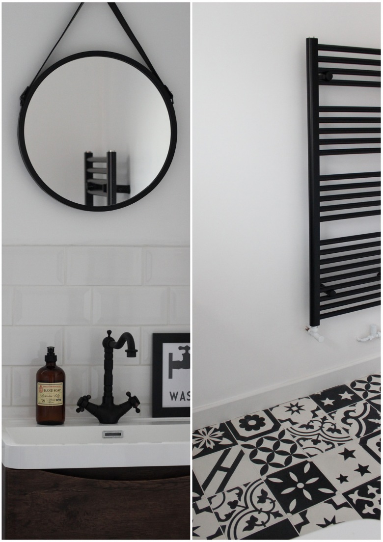 Czarne dodatki mocno wyróżniają się w białej łazience. Prosta forma elementów wyposażenia - jak okrągłego lustra czy grzejnika w kolorze - w pewien sposób kontrastuje z intensywną mozaiką na...