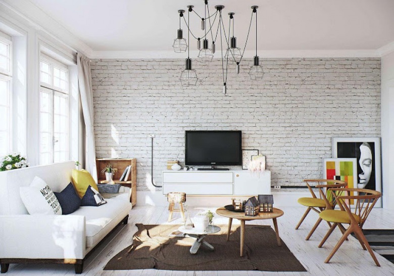 Biała cegła na ścianie w salonie,biała sofa,druciane lampy na wiszących czarnych kablach (48105)