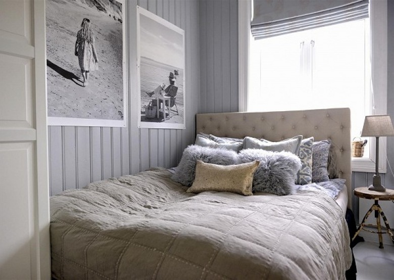 Szare panele,jedwabna narzuta i futrzane poduszki na pikowanym łóżku (21612)