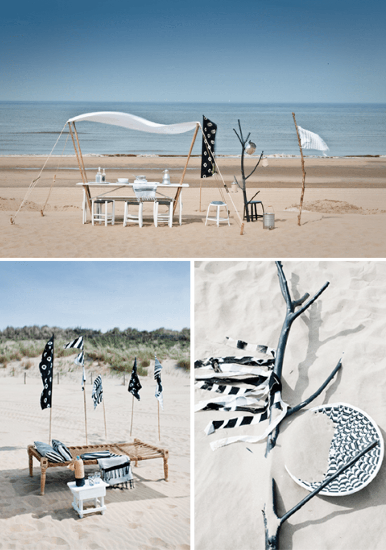 czarno-biała inspiracja plażowa - z małym, białym domkiem i czarno-białymi dekoracjami na tarasie i plaży